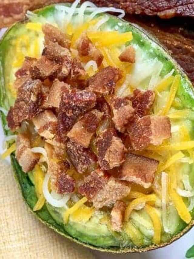 Baked Egg In Avocado With Bacon And Cheese Story