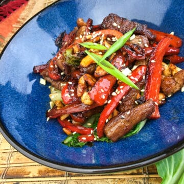 cooked stir fry in blue bowl