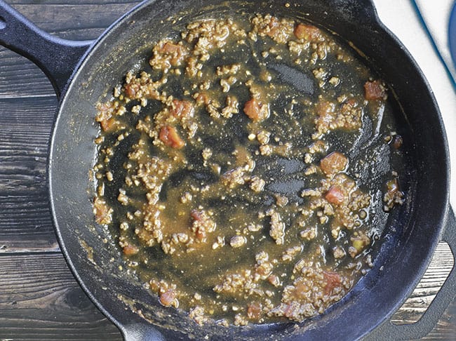 thin layer of meat sauce in skillet