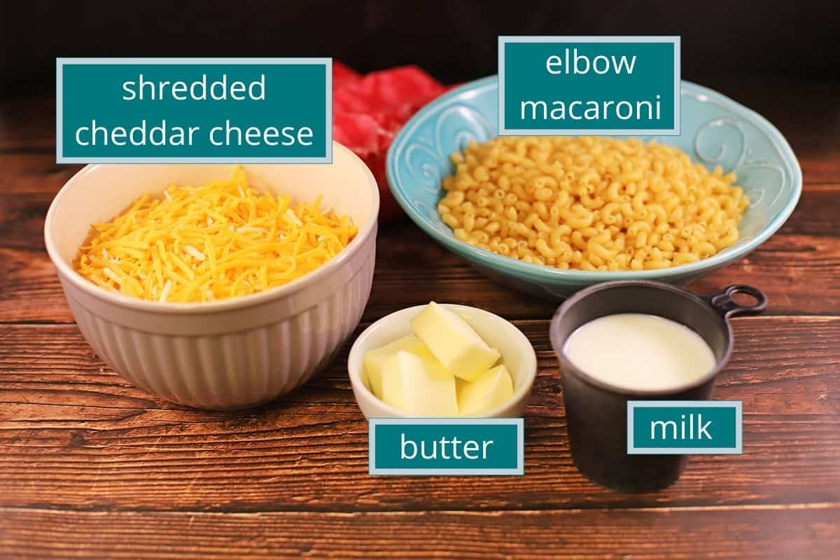 ingredients measured out in assorted bowls on wooden countertop