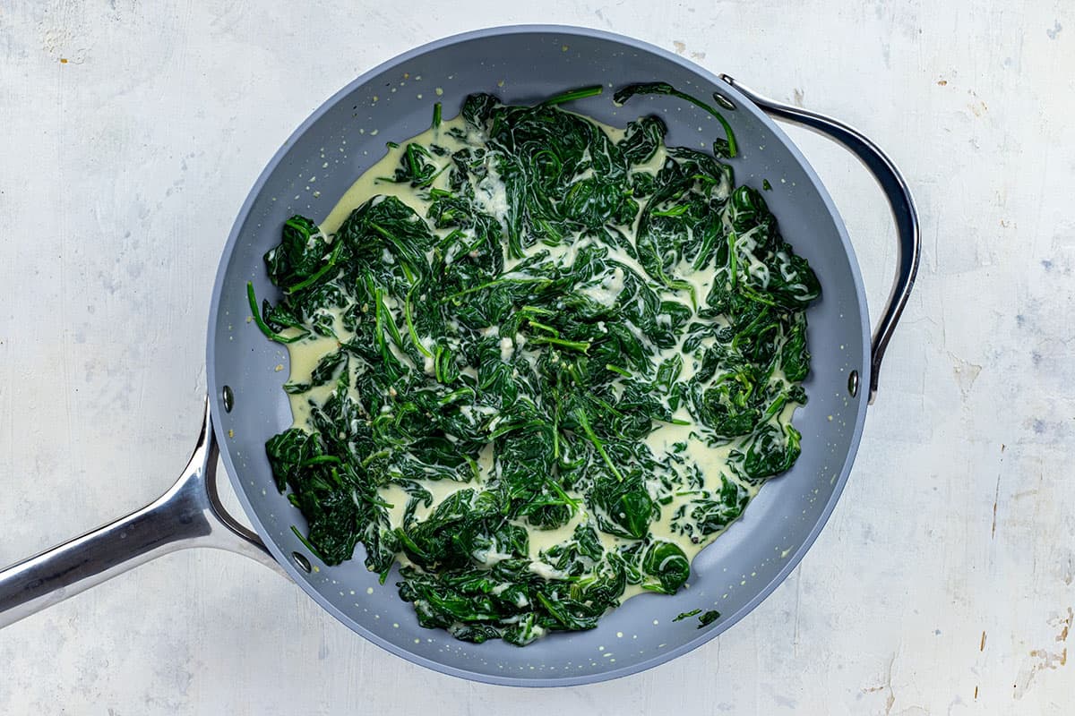 Spinach with cream in pan