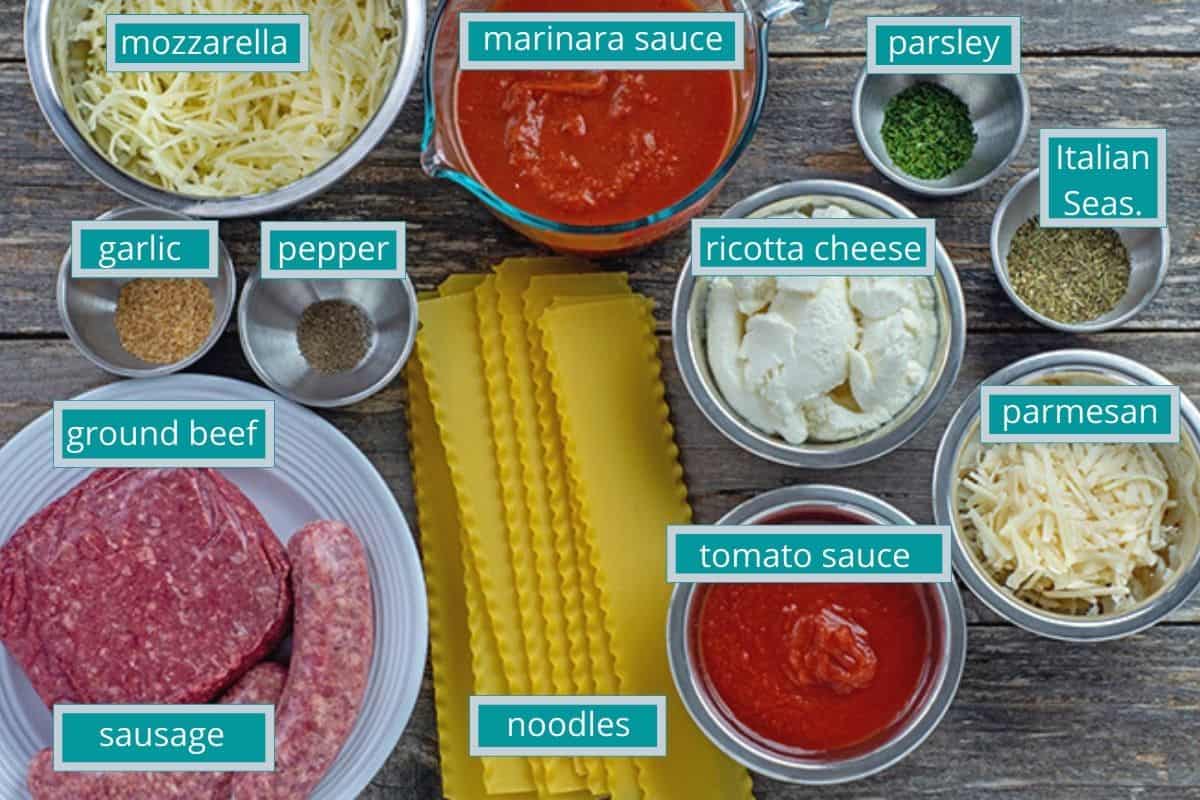 lasagna ingredients measured out in containers on counter top