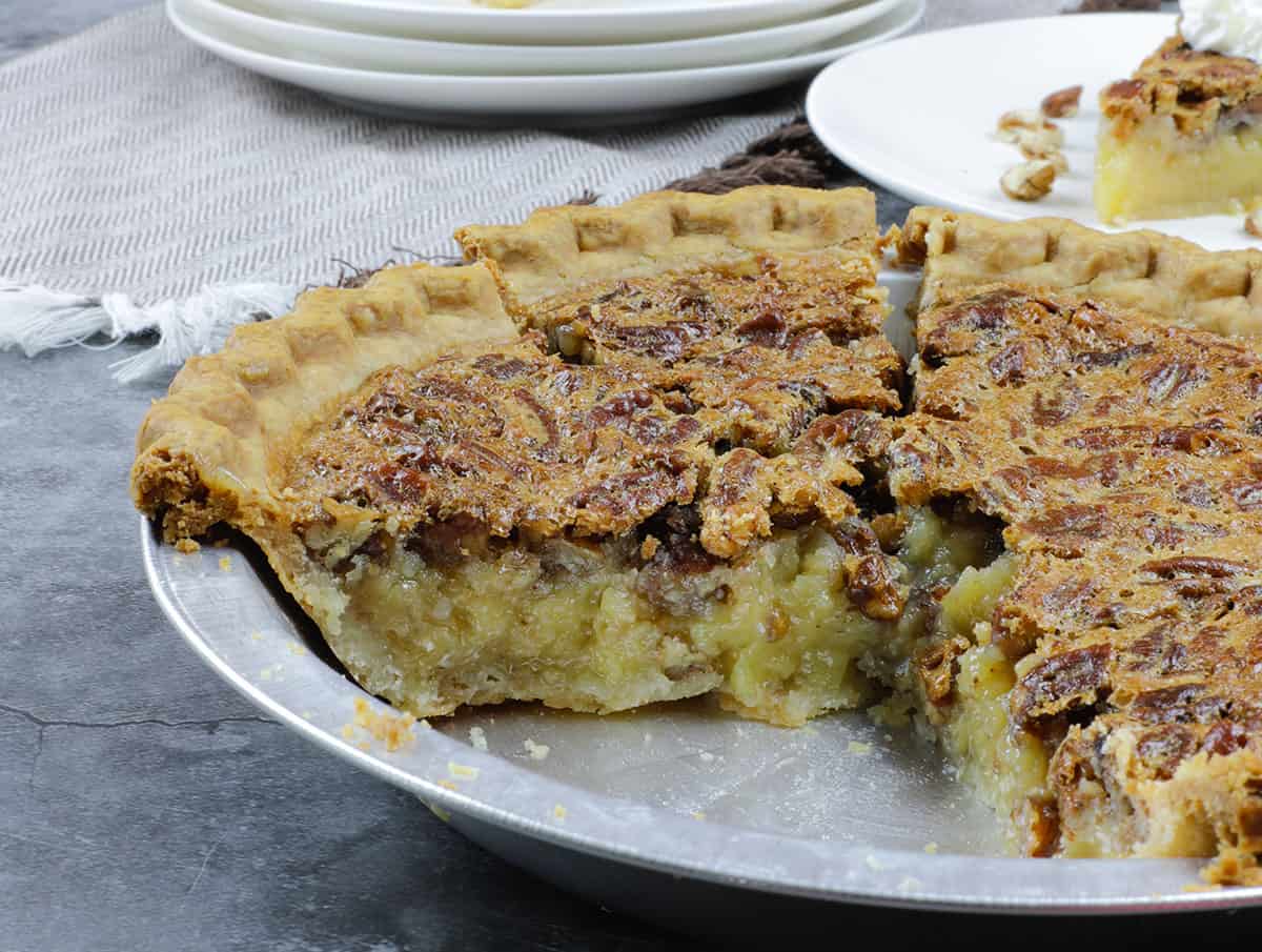 pecan pie whole with slices removed
