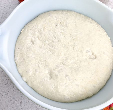 dough in bowl after rising