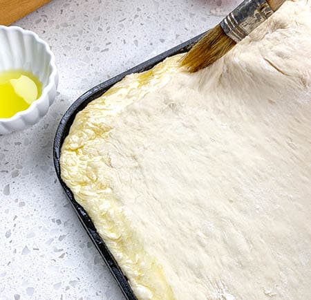 olive oil brushed around crust