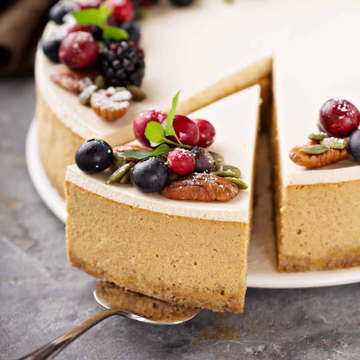 cheesecake topped with nuts and berries