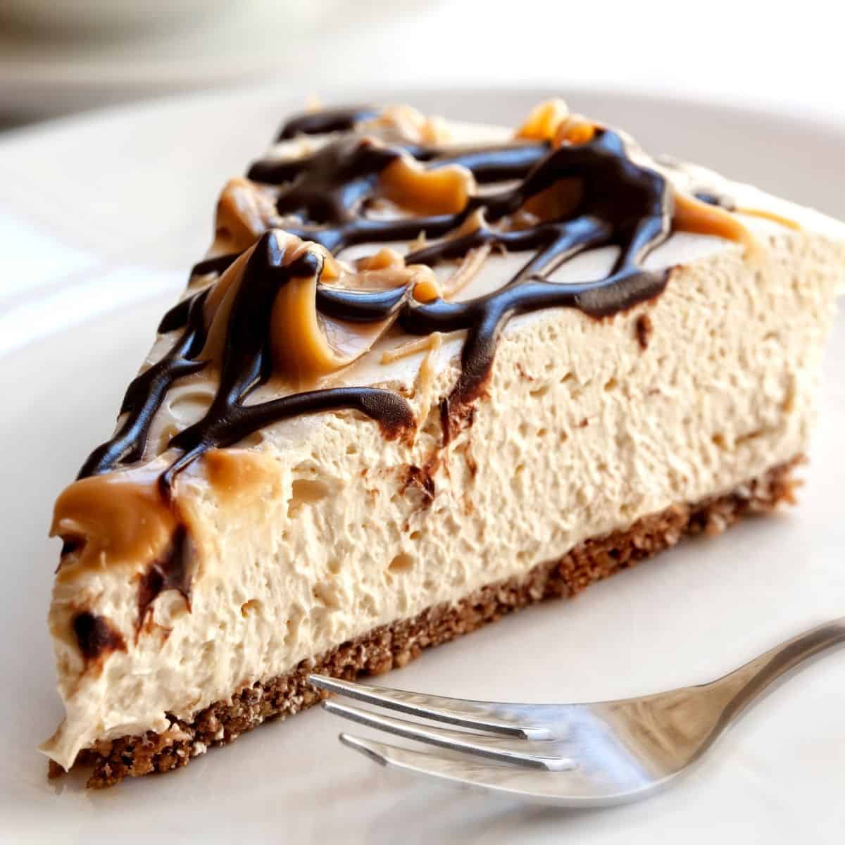 Cheesecake Topped With Peanut Butter And Chocolate Syrup 