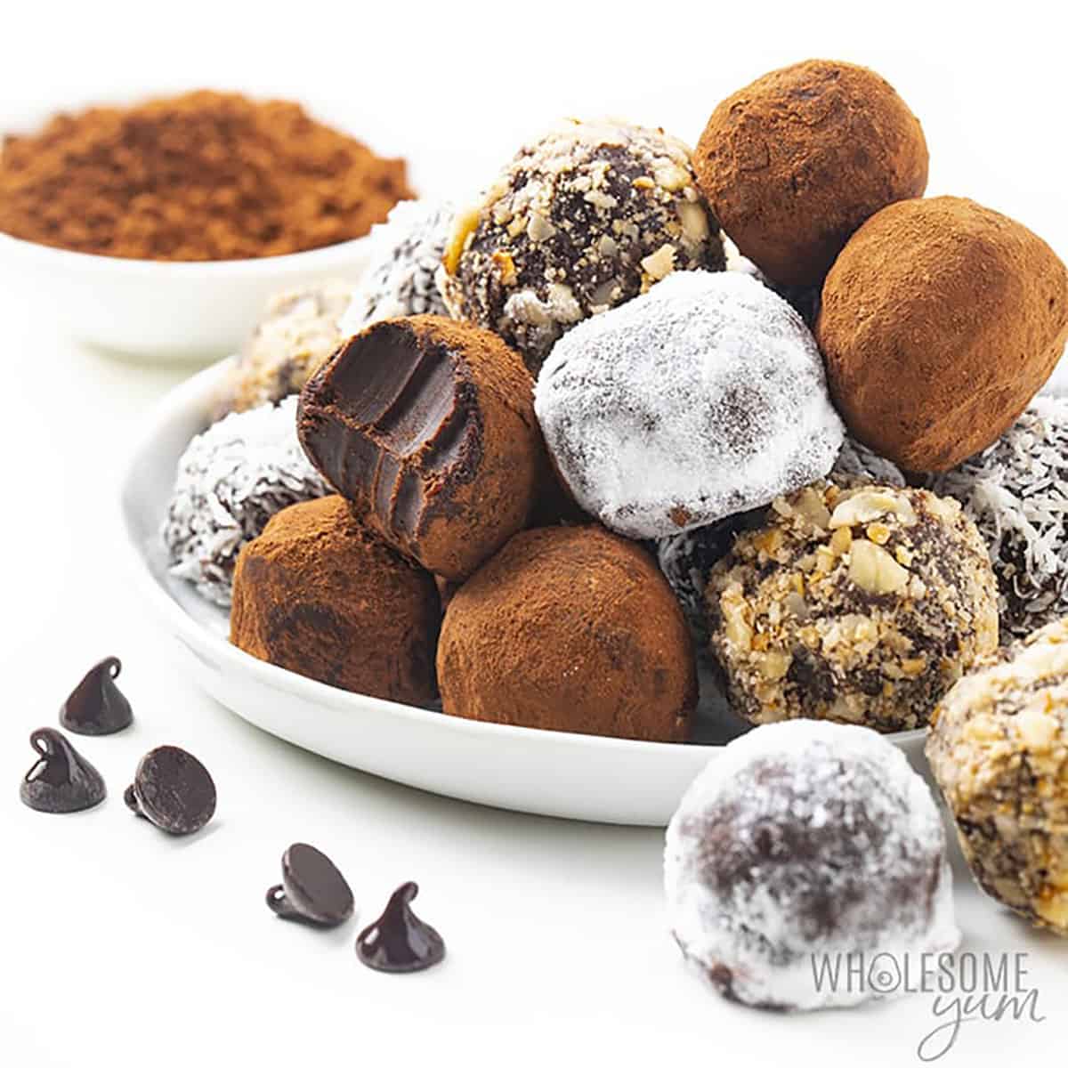 an assortment of truffles on white plate