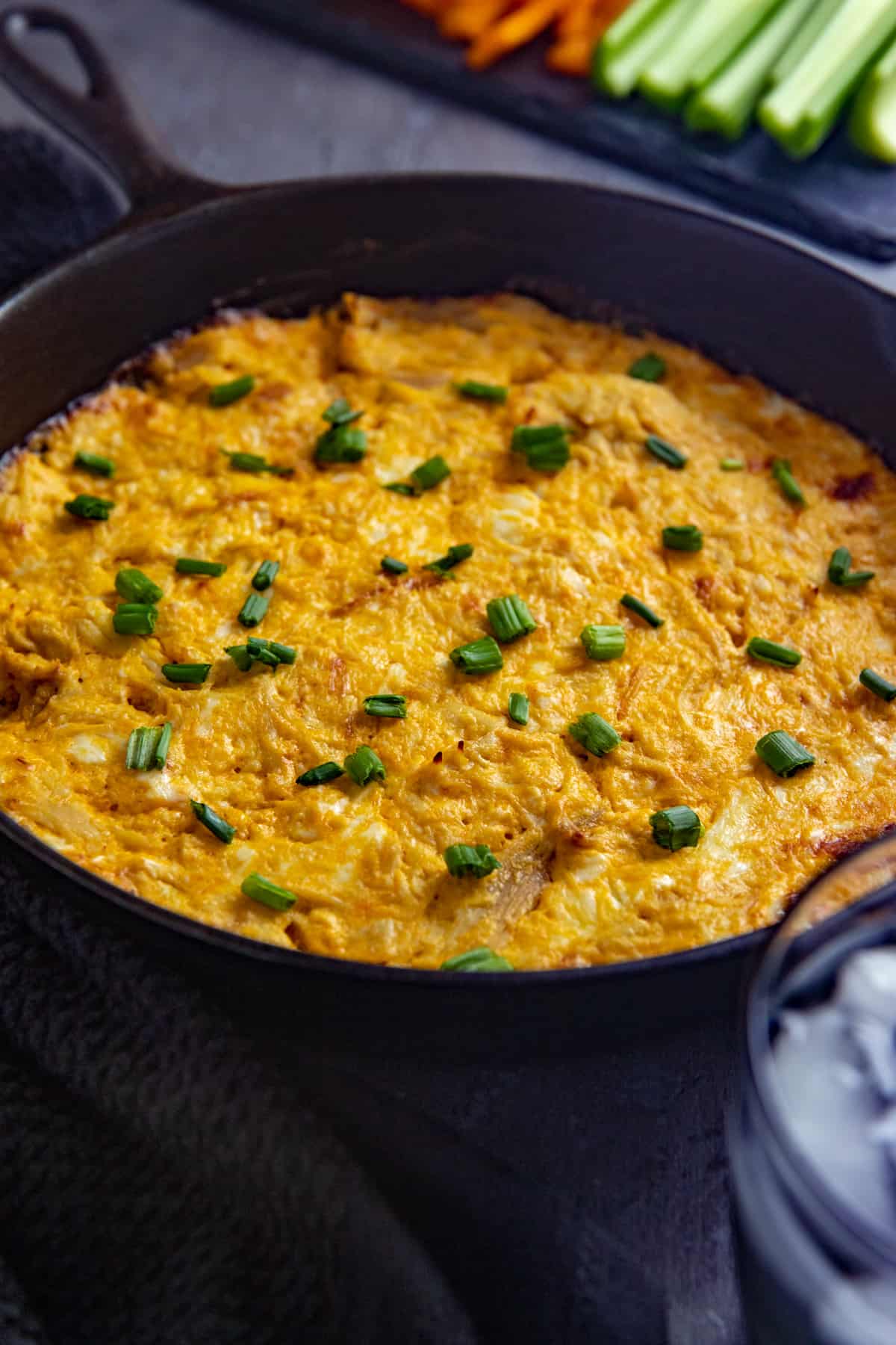 Baked dip in cast iron skillet.