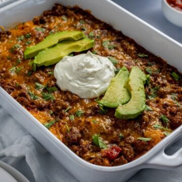 picture of lazy beef enchiladas in white casserole dish
