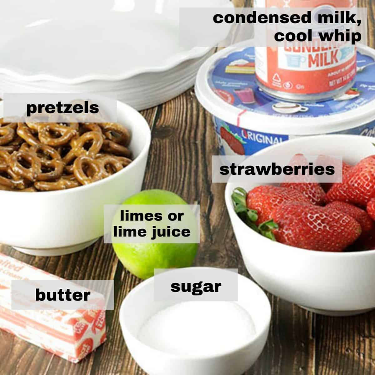 Ingredients measured out in individual containers on counter top with white pie plate in background.