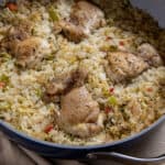 cooked chicken and rice in skillet
