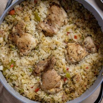 cooked chicken and rice in skillet