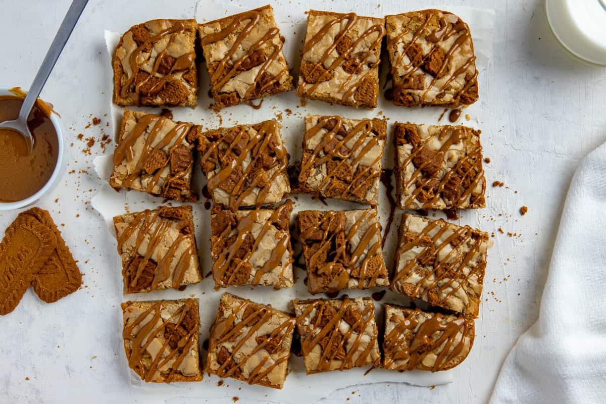 Baked biscoff blondies cut into squares.