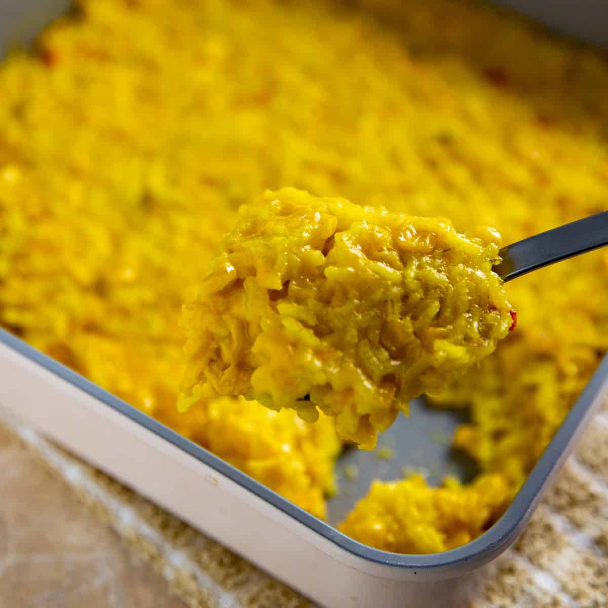 https://mykitchenserenity.com/wp-content/uploads/2023/10/Yellow-seasoned-rice-and-corn-casserole.jpg