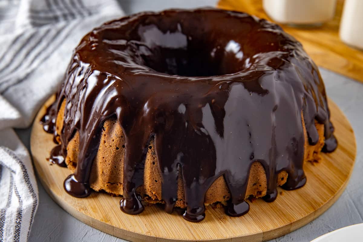 Chocolate ganache poured over the cake.