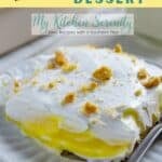 One serving of lemon lush on a white plate.