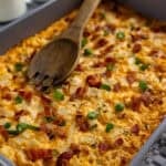 Baked hashbrown casserole in rectangular baking dish.