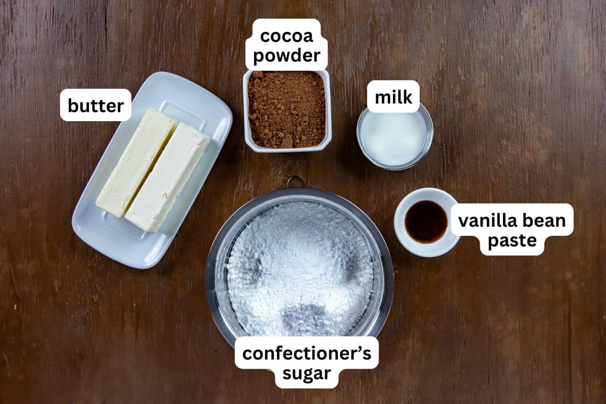 Frosting ingredients measured out in individual containers.