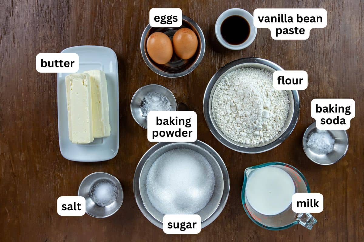 Cake ingredients measured out in individual containers.