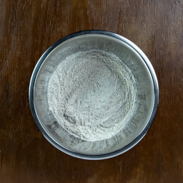 Flour, pumpkin pie spice, baking soda, baking powder and salt mixed up in a separate bowl.