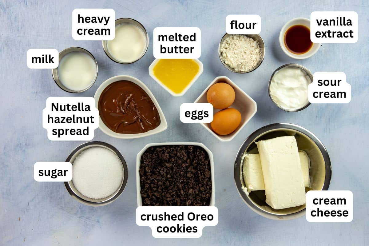All ingredients measured out in individual containers on white marble countertop.