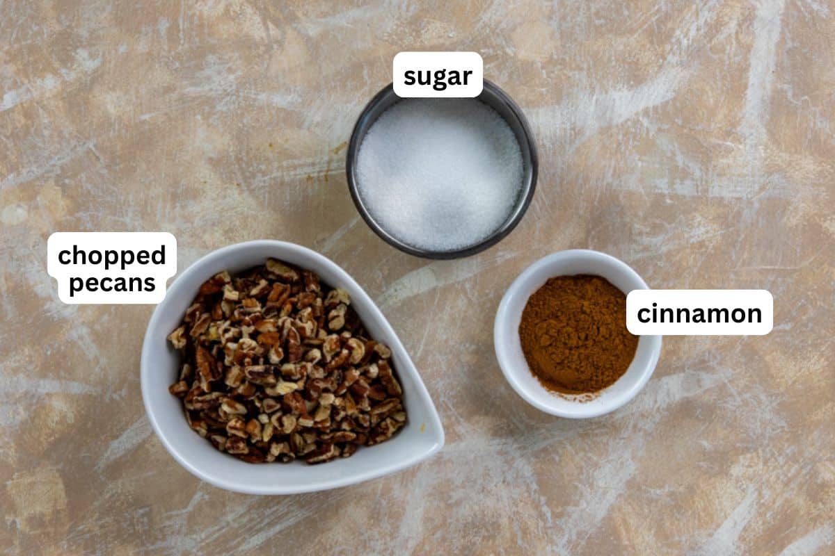 The cinnamon-sugar-pecan ingredients measured out in individual containers.