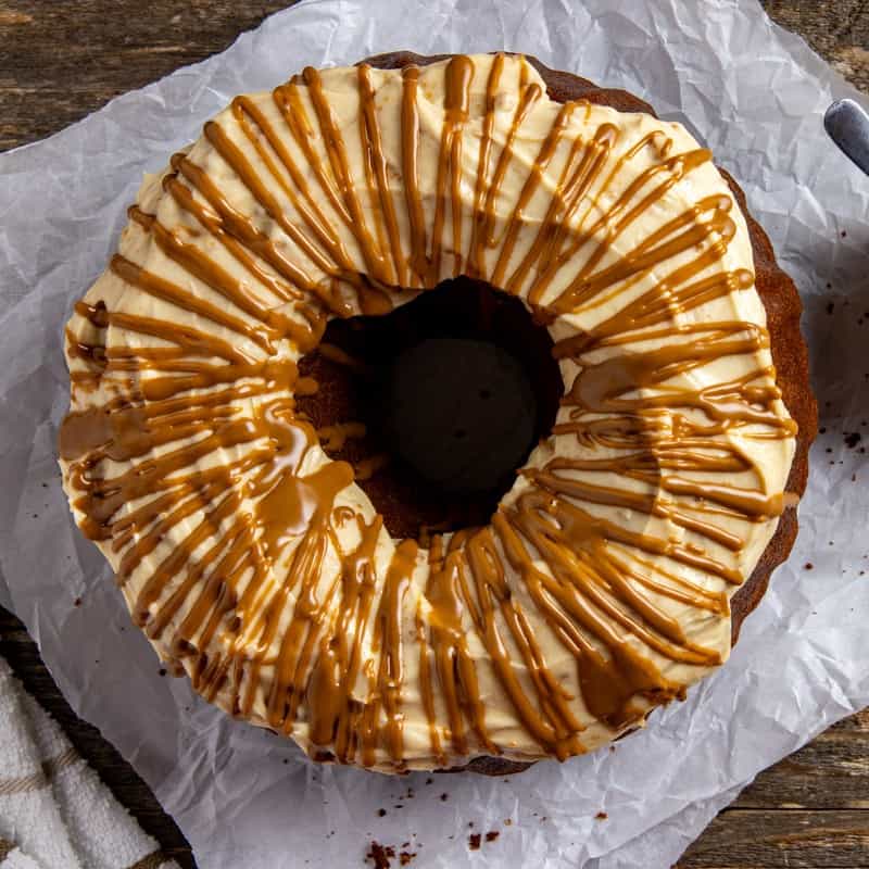 Baked Bundt cake with cream cheese frosting and cookie butter glaze.