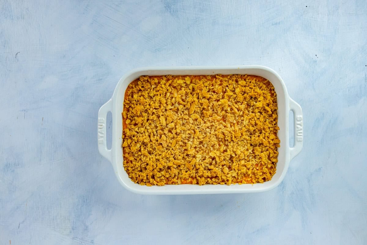 Baked casserole in a rectangular, white casserole dish.