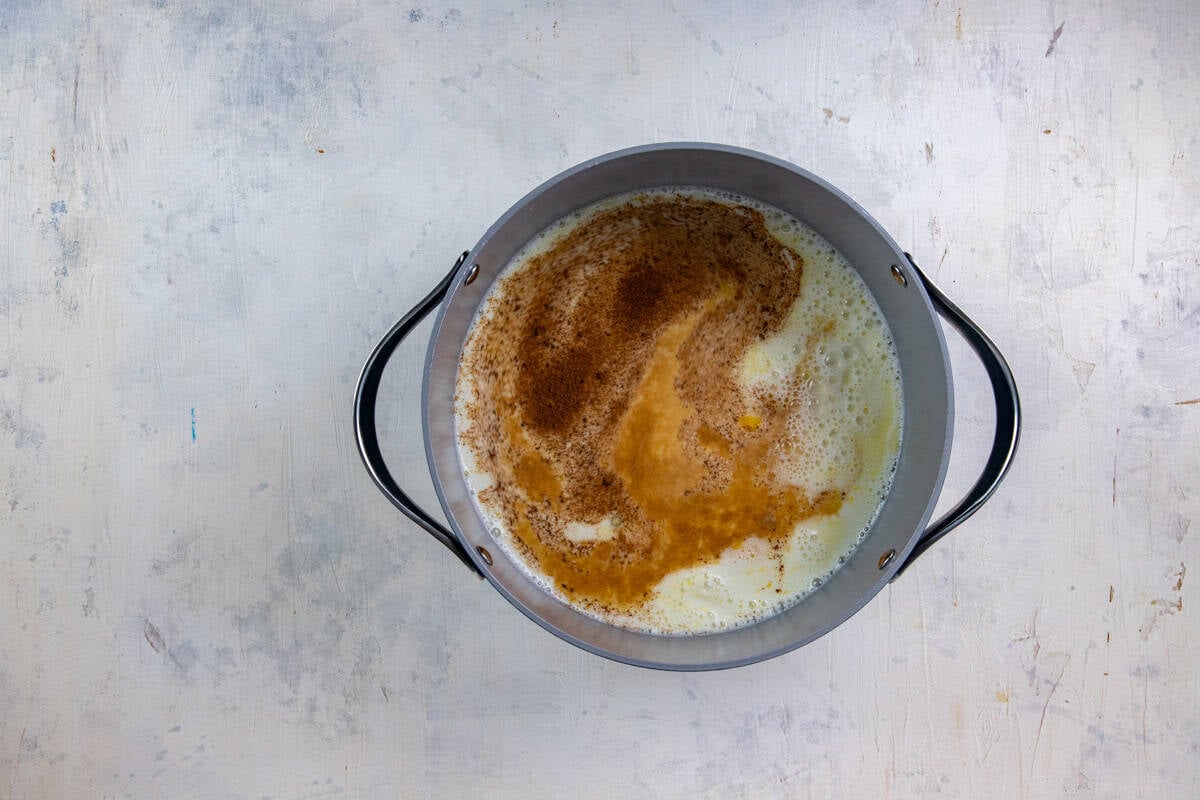 Eggs, sugar, milk, vanila extract, and nutmeg in a sauce pan.