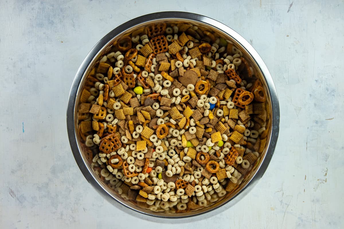 Peanut M&Ms, pretzels, Cheerios, and Chex Mix in a bowl