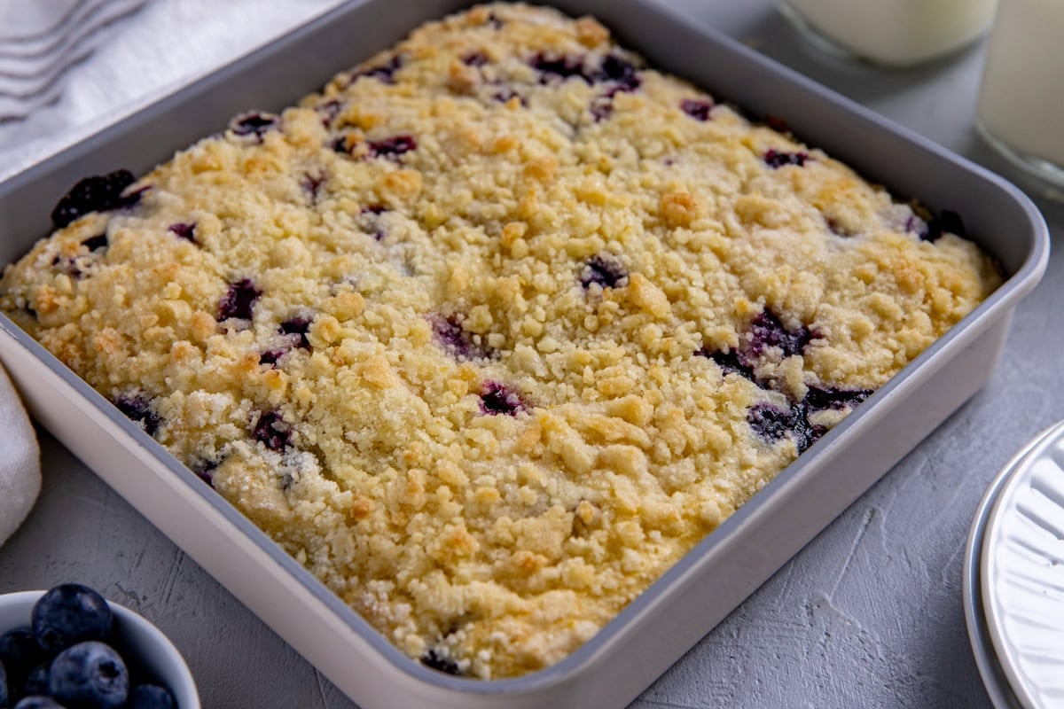 Baked coffee cake in a square baking pan.
