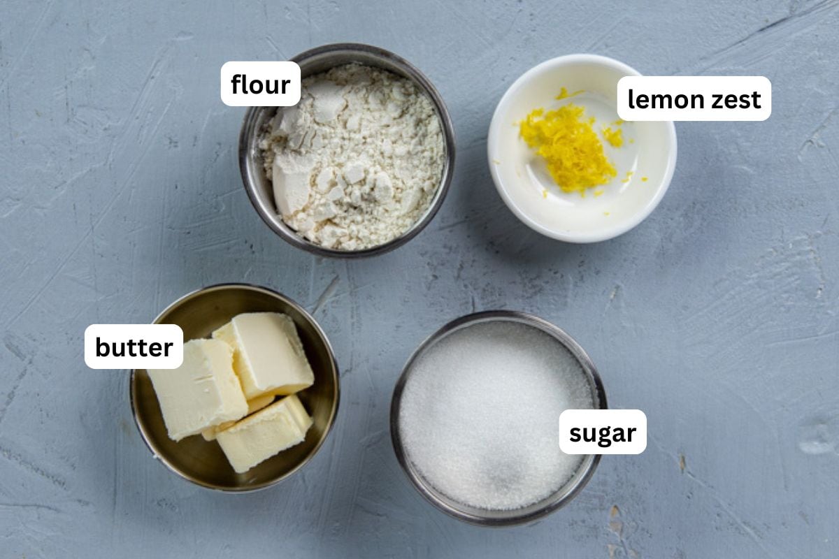 Crumb topping ingredients measured out into separate containers.