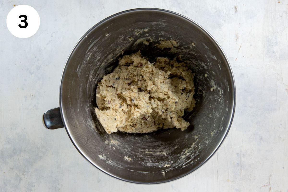 Dry ingredients mixed into the wet ingredients in a bowl.