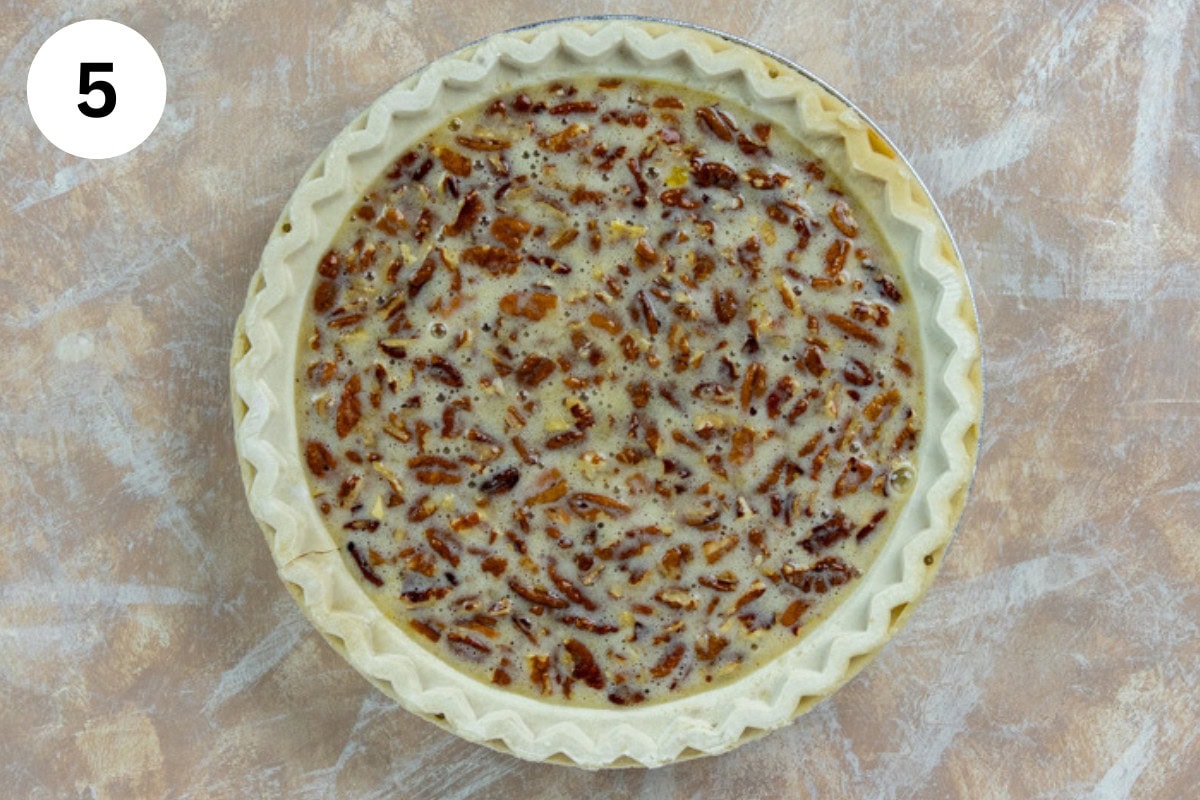 A whole unbaked pecan pie.