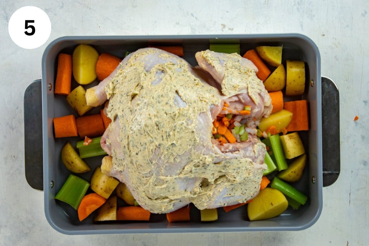 Garlic herb butter rubbed all over the whole chicken in the pan.