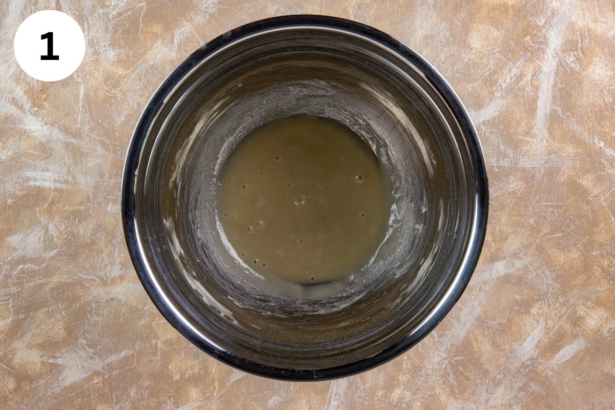 Sugar, flour, and pineapple juice blended in a bowl.